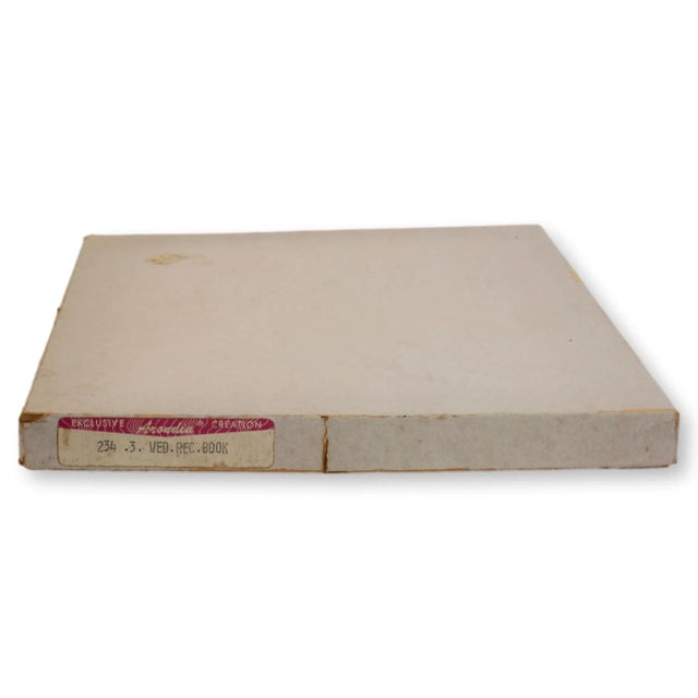 Midcentury wedding book in original box, including wedding tips and guide. Pages from Modern Bride magazine and a guide...