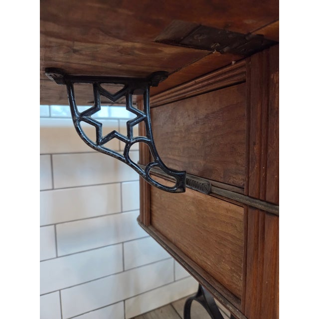 Antique Davis Treadle Sewing Machine in Wooden Cabinet With Ornate Cast Iron Base, Late 19th Century For Sale - Image 9 of 14