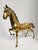 This very large brass horse, almost 22 inches in length, would look great with a variety of décor, from traditional to...