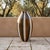 A striking Mid-Century Modern ceramic floor vase featuring bold hand-applied vertical bands in warm brown, cream, and...