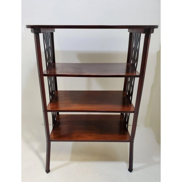 A three shelf Jugendstil bookcase / etagere / bakers rack, two tone in stained and polished beechwood with decorative...