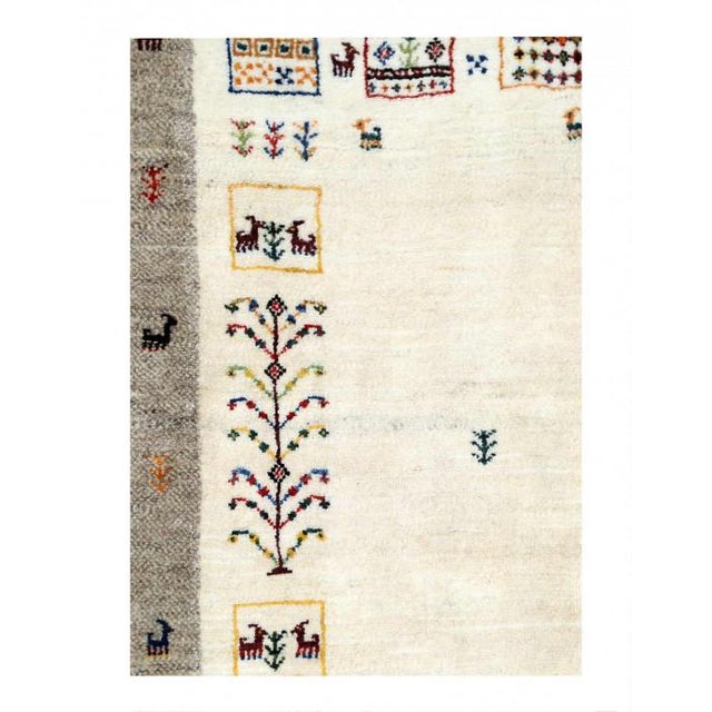 Gabbeh Rugs feature hand-spun wool in both the pile and foundation. These rugs are characterized by their abstract designs...