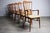 About this Gorgeous Set of 6 Koefoeds Hornslet 'Ingrid' Chairs: Sinuous sculpted curves with delicate supports carved from...