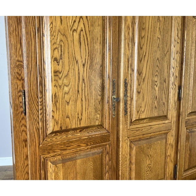 Metal Vintage French Style Carved Oak 4-Door Armoire For Sale - Image 7 of 12