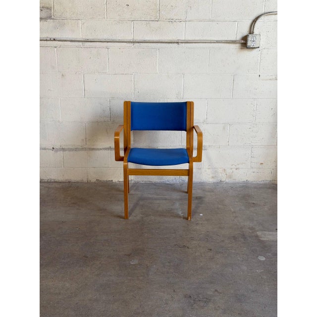 Beautiful vintage Danish armchair designed by Magnus Olesen for Bondo Gravesen, crafted in Denmark with sculptural...