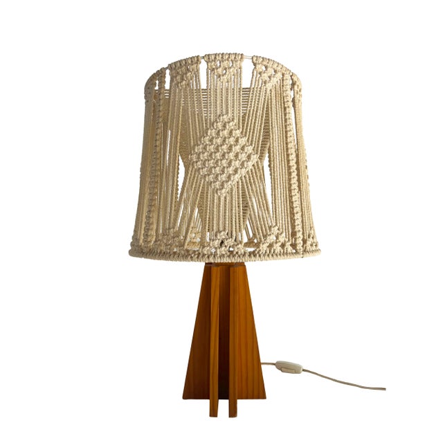 Immerse yourself in the serenity and natural charm of our table lamp, where craftsmanship and warmth meet in perfect...