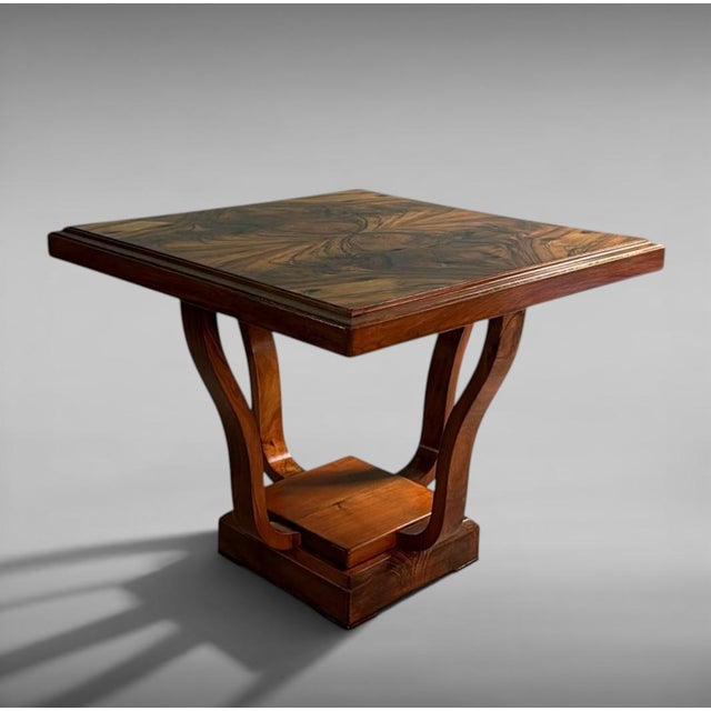 Refined and elegant, this Italian coffee table is distinguished by its clean, linear form and harmonious proportions. The...