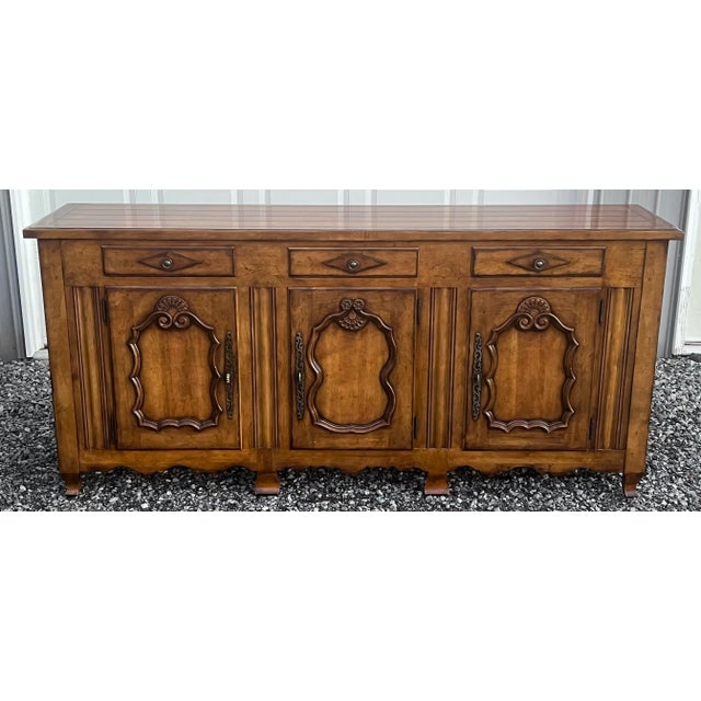 Monumental size French Country credenza / sideboard by Century Furniture. The Melbourne credenza is expertly crafted in...