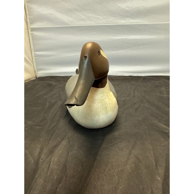 This Vintage P. Mountjoy Original Signed Pintail Drake Carved Wood Duck Painted Decoy is a collectible piece from the...