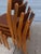 Set of Danish, teak and birch stacking chairs. Very solid somewhat like Chairs designed by Peter Hvidt. This model is...