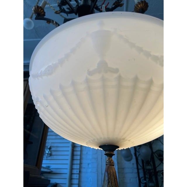 Elevate the ambiance of your living space with this mesmerizing rococo pendant chandelier. Meticulously crafted with a...