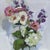 Confetti by Yana Beylinson | Oil on board Floral arrangement with pink and purple flowers For Sale
