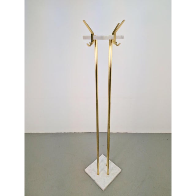 Italian Carrara marble and brass freestanding coat rack, 1960s Give your entryway or hallway a touch of glamour with this...