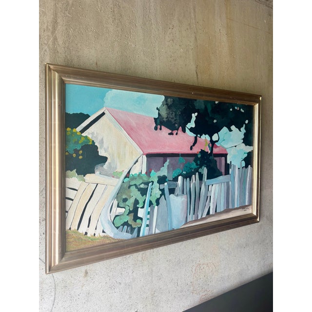 A vibrant vintage painting by Haitian artist Phillip “Fillmore” Outten depicting a charming architectural landscape with a...