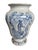 A character rich Italian pottery vessel, hand-painted in cobalt blue on a creamy white ground. The decoration features a...