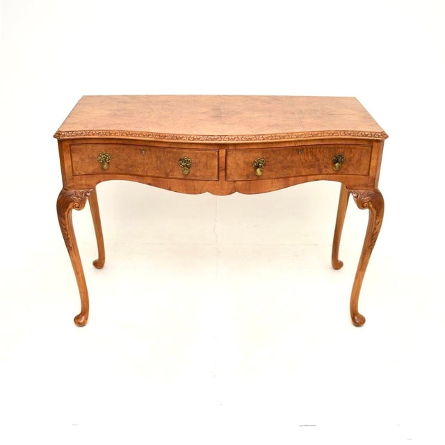 A superb antique burr walnut console / side table in the Queen Anne style. This was made in England, it dates from the...