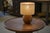Turned Walnut Burl Lamp, 1940s, in Very Good conditions. Designed 1920 to 1949 European Plug (up to 250V).The wiring of...