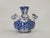 Beautifully crafted, this vintage Delft-style blue and white tulip vase features seven individual spouts designed for...