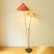 Very beautiful floor lamp with two original pointed cone shades produced by Rupert Nikoll in Austria in the 50s. The lamp...