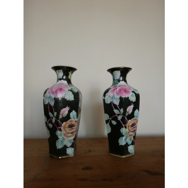 Beautiful pair Nippon handpainted porcelain vases with gold banding. Nipon mark shown on bottom. Some of the gilding on...