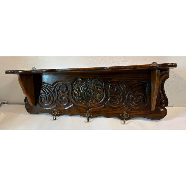 Nice vintage pot rack. Originally used to hang pots but makes a great coat and hat rack. This one has a bonus shelf!
