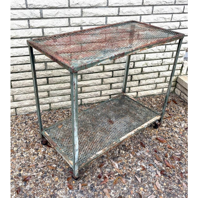 1940s-50s heavy industrial metal 2-tier rolling cart. Great for gardening or outdoor serving. Some rust and surface patina...