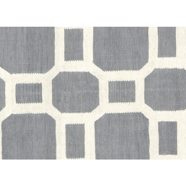 Contemporary Egyptian Kilim. Hand woven in modern designs with wool on cotton foundation in the Fustat region of the Nile...