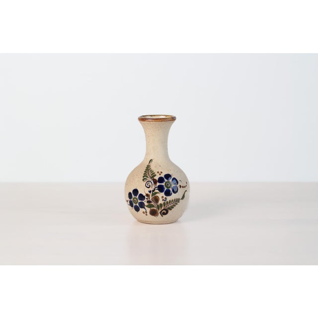 Vintage Mexican tonala pottery bud vase featuring a softly rounded form finished in warm earthenware tones with hand-...
