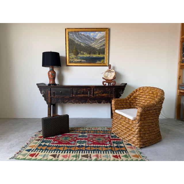 This vintage Chinese altar console table showcases the timeless elegance of traditional Eastern craftsmanship. Crafted...