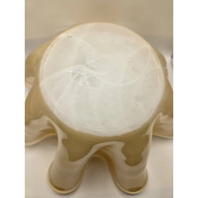 Elegant hand-blown Italian Murano glass bowl featuring the classic handkerchief-style ruffled rim. Crafted by skilled...