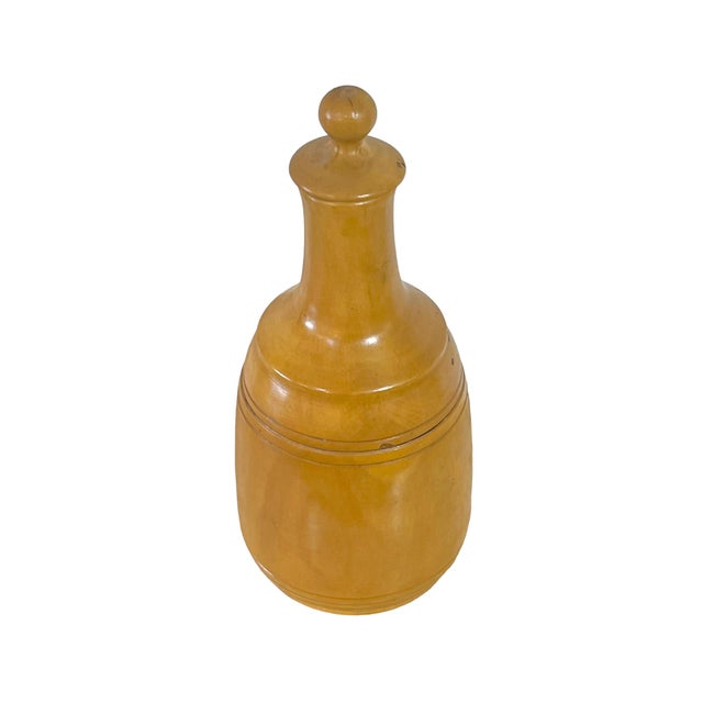 Vintage treen bottle with original stopper. Hand carved Costa Rican wood. The natural elements of the wood are highlighted...