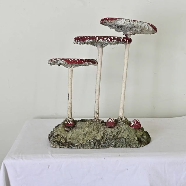 Dimensions: 20 ¼” H x 18 ¼” W x 11” D A curious and whimsical family of toadstools made in England to populate your garden...