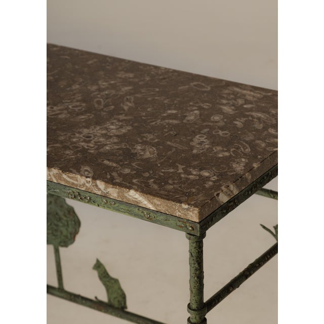 Giacometti inspired wrought iron table with verdigris finish