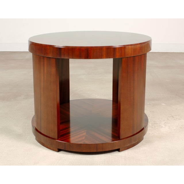 Handsome Italian mahogany round drum table designed by Ralph Lauren inspired by early 20th century art deco. The modern...