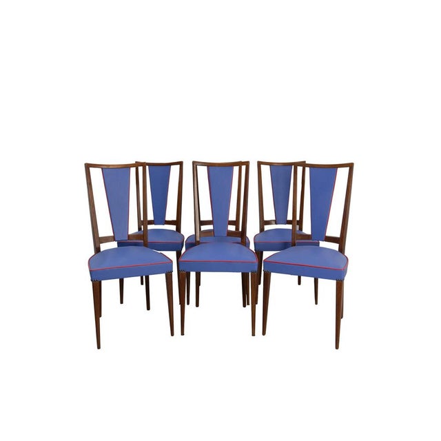 Set of six French dining chairs circa 1960 An elegant set of six Art Deco-style dining chairs, crafted from solid teak....