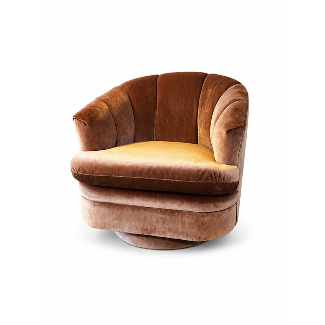 This is a Vintage 1970s handcrafted Charles Schneider Mid Century Modern Channel Back Swivel Chair upholstered in a velvet...