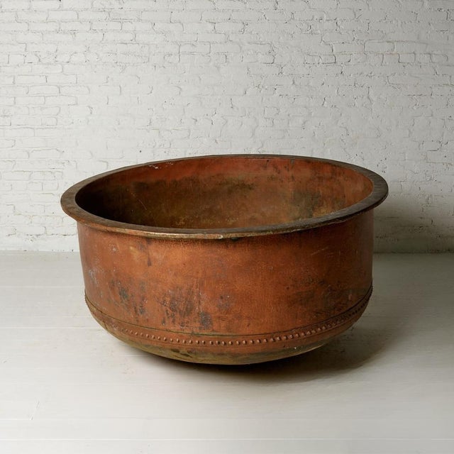 This 19th Century French Industrial Copper Cheese Pan is a remarkable example of antique European utilitarian design,...