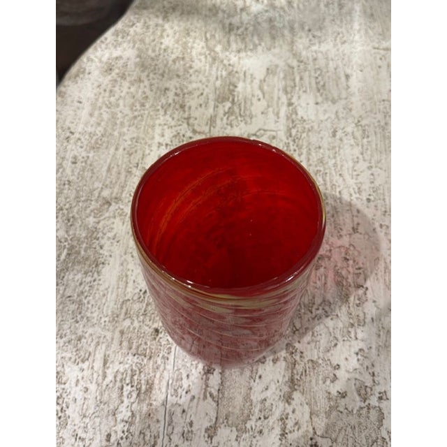 Decorative Red Murano glass vase with gold accents. A wonderful accessory! This vase would also make a great gift 5.5w x 10h