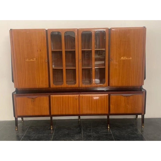 Vetrina libreria a doppio corpo di Vittorio Dassi, impiallacciata in palissandro profili ebanizzati dettagli in mogano,...