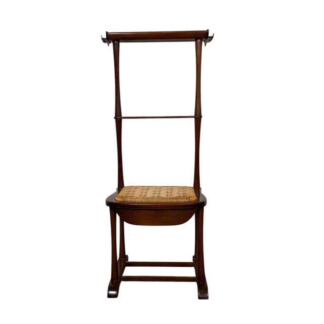This Mid-Century Italian valet by SPQR features a woven rattan seat with a tray top and removable drawer. Seat height is...