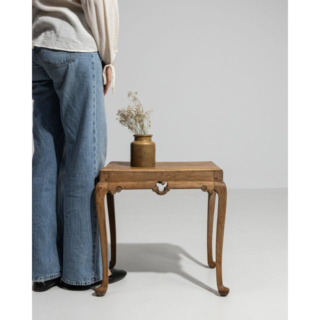 Carved oak side table in Weathered Honey Oak. The weathered honey oak surface highlights cabriole legs, heart-shaped apron...