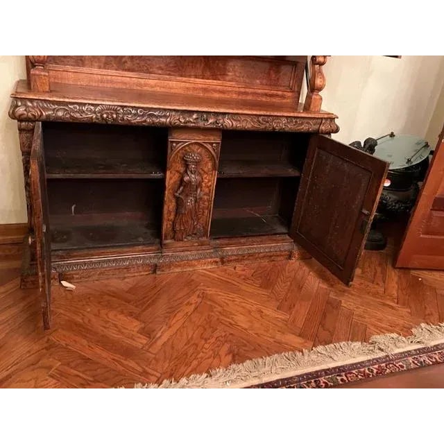 This stunning Gothic-style bookcase is a true antique gem that any collector would love to have in their home. Its...