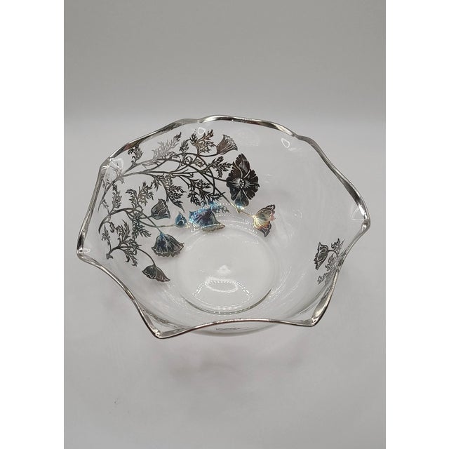 This pair of scalloped florist's bowls, or serving bowls for nuts or candy, await their new custodian. Silver overlay in a...