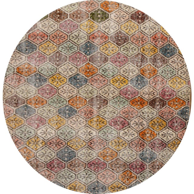 Beautiful Vintage Turkish rug, hand-knotted wool with a multi-color field in a gorgeous all-over geometric design. This...