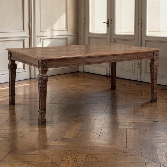 French Louis XVI Style Walnut Dining Table with Parquetry Top is beautifully proportioned dining table inspired by the...