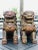 Gorgeous pair of Asian Chinese style foo dog carved wood both caring a ball inside their mouths. red, green and guilted...