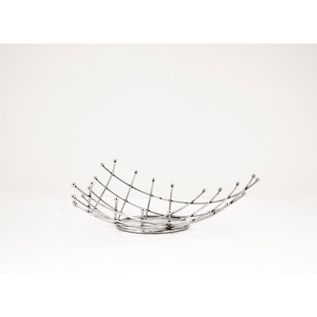 This lightweight, timeless basket in the Mid Century Modern and Space Age style combines functional design with a...