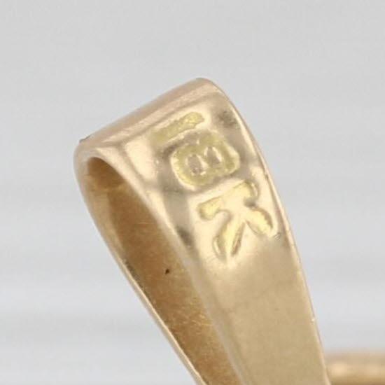 Gemstone Information: - Natural Emerald - Carats - 0.20ct Cut - Emerald Color - Green Treatment - Oiling Metal: 18k Yellow...