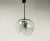 A round pendant lamp by Koch & Lowy for Peill and Putzler made in Germany in the 1960s. It is fascinating with its...