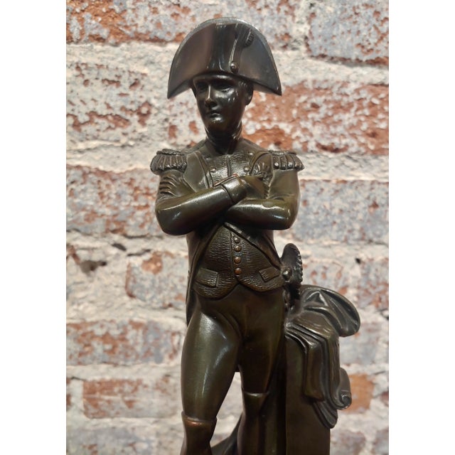 Napoleon Bonaparte in Uniform -19th century Bronze sculpture patinated bronze sculpture on black wooden pedestal- circa...